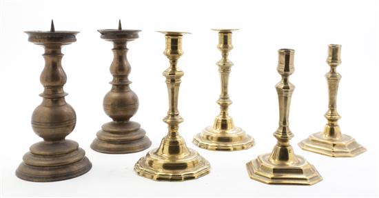 Two Pairs of Brass Candlesticks together