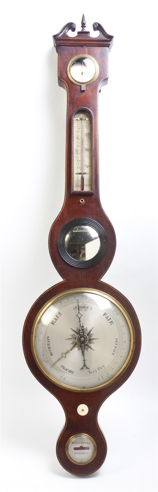 A Mahogany Wheel Barometer having a