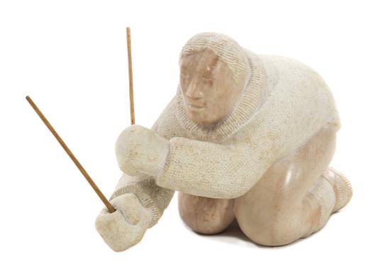 A Carved Stone Inuit Figure L.