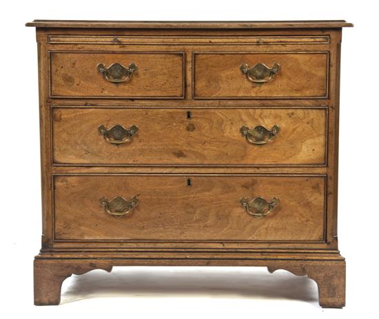 * A George III Style Walnut Chest