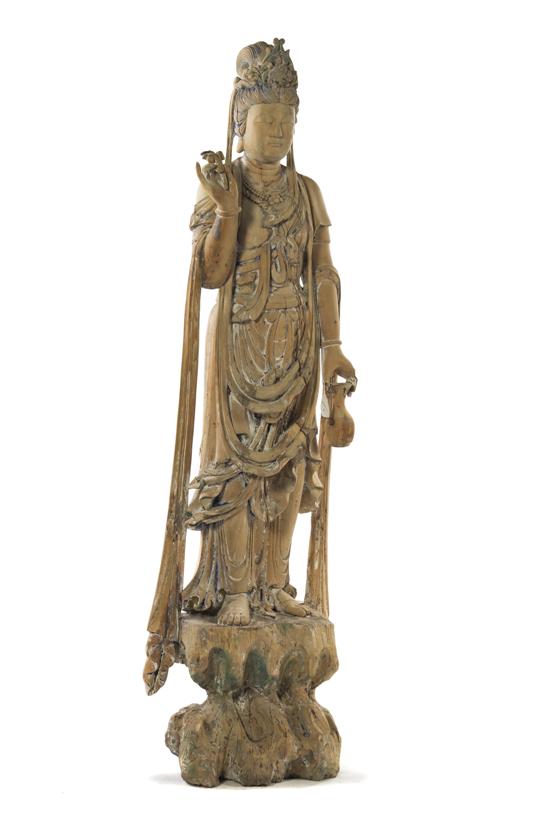 A Carved Wood Figure of Guanyin 152445