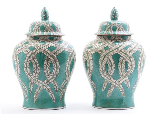 A Pair of Indian Ceramic Lidded Urns