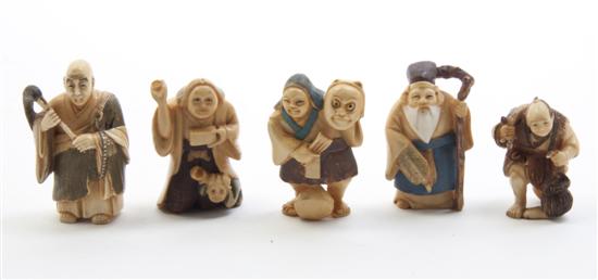 A Group of Five Ivory Netsuke each depicting