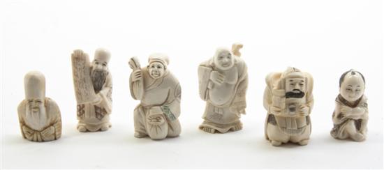 A Group of Six Ivory Netsuke each