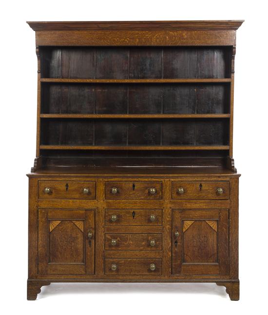 A Welsh Oak Cupboard having a molded 152517