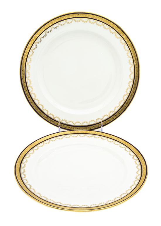 A Set of Nine English Porcelain Dinner