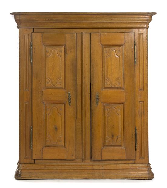 An Alsatian Oak Armoire having a stepped