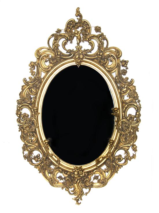 A French Giltwood Mirror of oval 1525f9