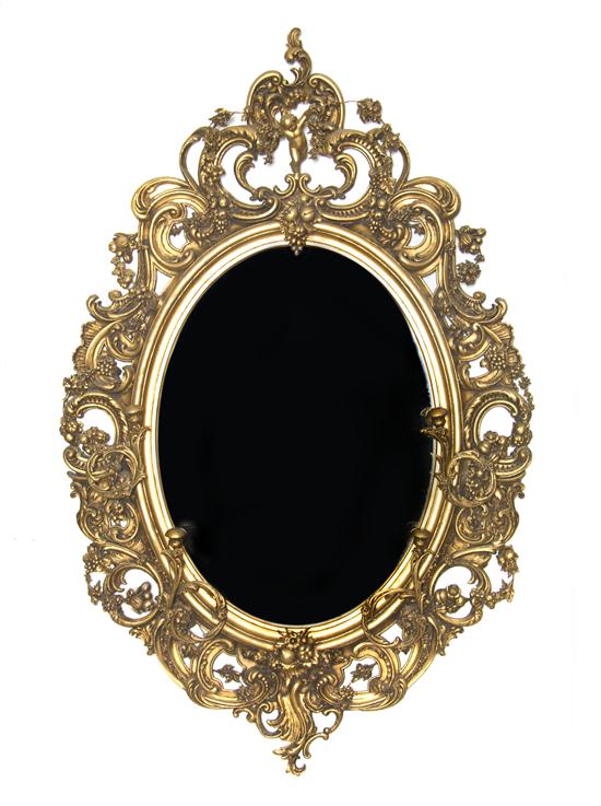 A French Giltwood Mirror of oval