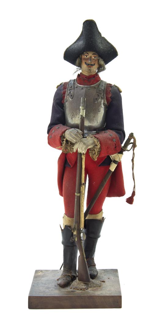 A French Carved Wood Military Figure