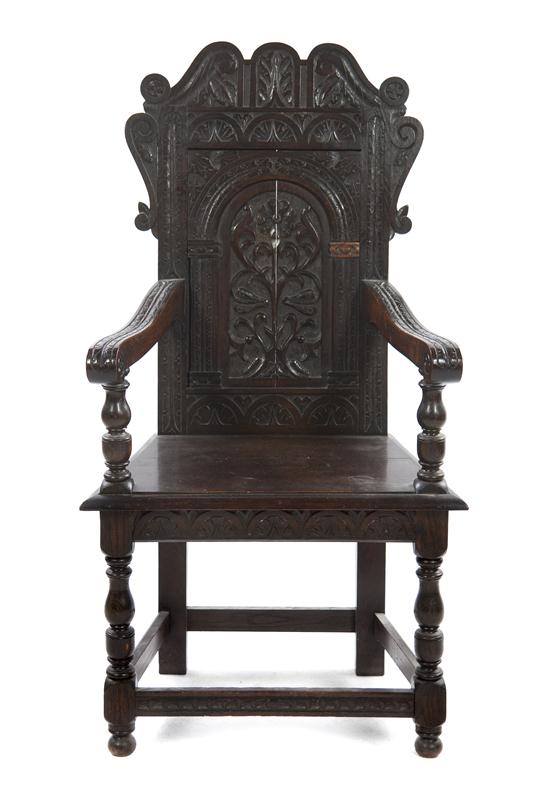 * A Renaissance Revival Open Armchair