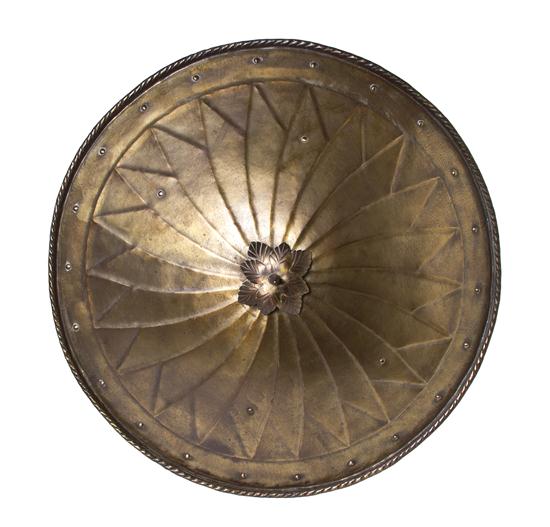 * A Spanish Hammered Metal Circular