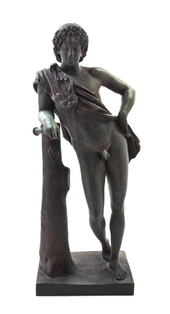 * A Bronze Figure after the Antique