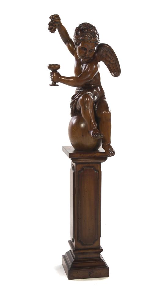 A Continental Carved Pine Figure