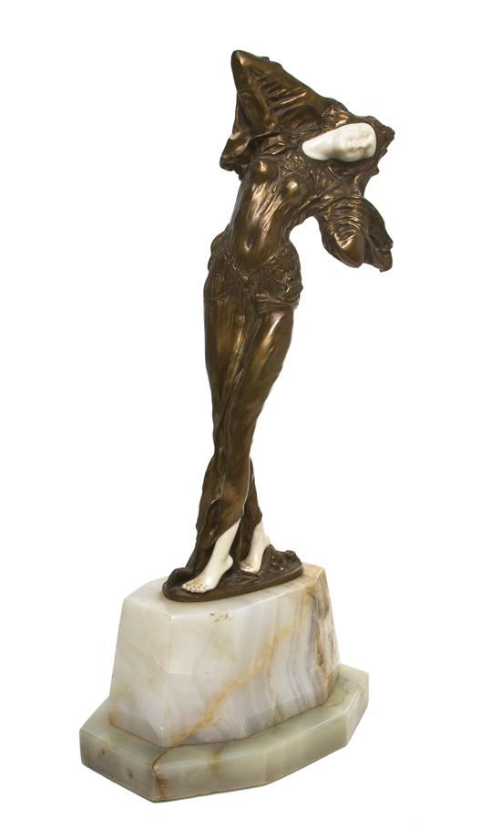 * A French Bronze and Ivory Figure Demetre