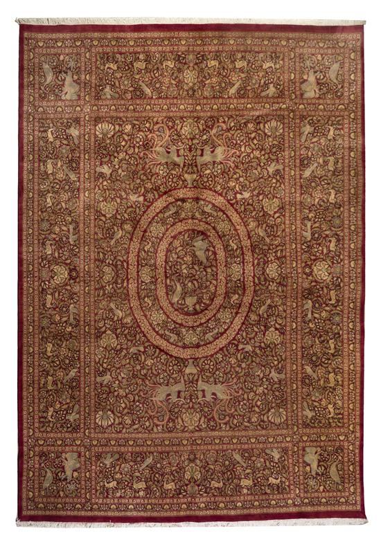 A Persian Wool Rug having a central 1527e0