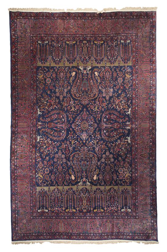 * A Kashan Wool Hunt Carpet having