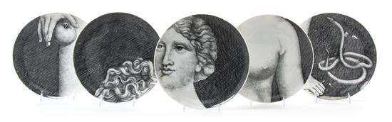 A Set of Twelve Fornasetti Eve