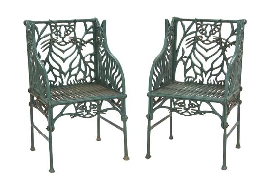 * A Pair of Cast Iron Chairs Richard