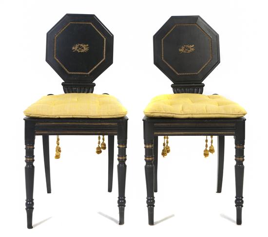 A Pair of English Ebonized and