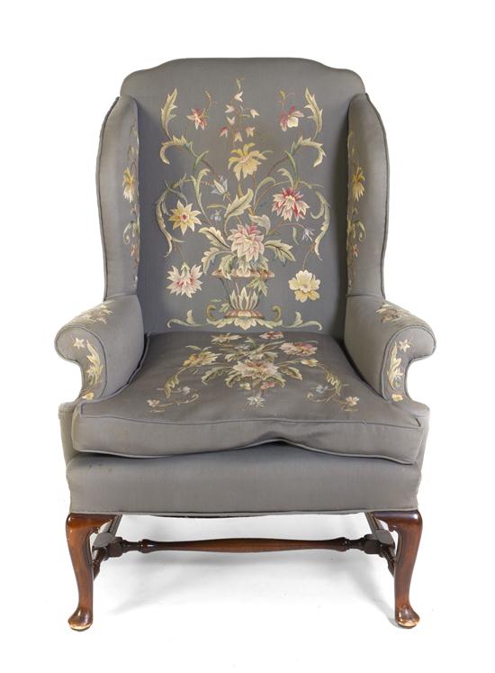 A Needlework Upholstered Wingback Armchair