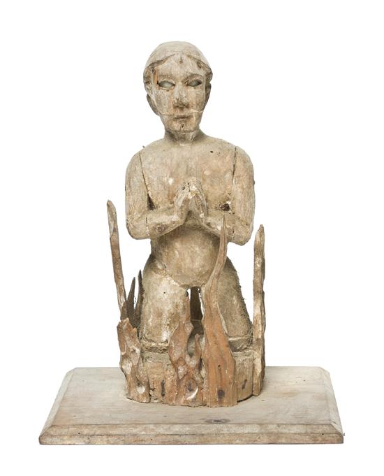 *A Folk Art Carved Figure depicting