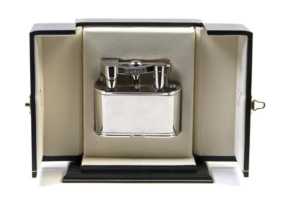 A Dunhill Table Lighter contained in
