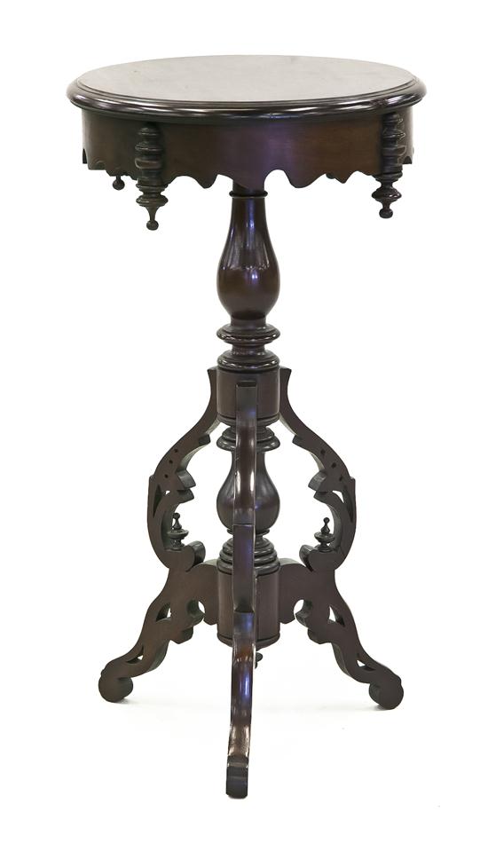 *A Victorian Mahogany Pedestal Table