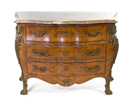 A Louis XV Style Walnut and Gilt