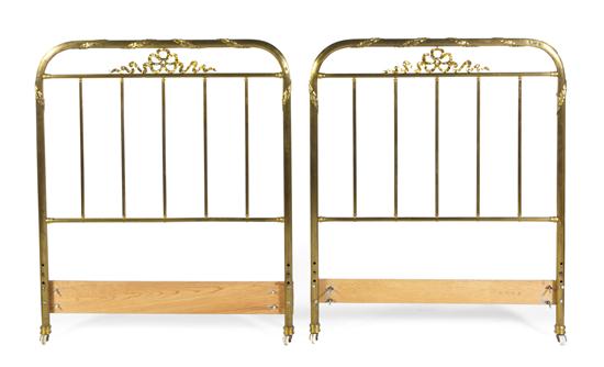 *A Pair of Louis XVI Style Brass