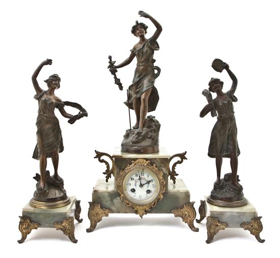 *A French Bronze and Onyx Three-Piece