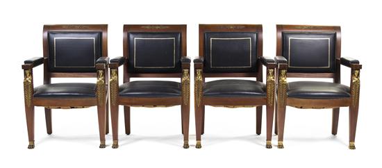 A Set of Four Empire Style Armchairs