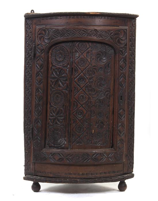 *A Continental Carved Hanging Corner