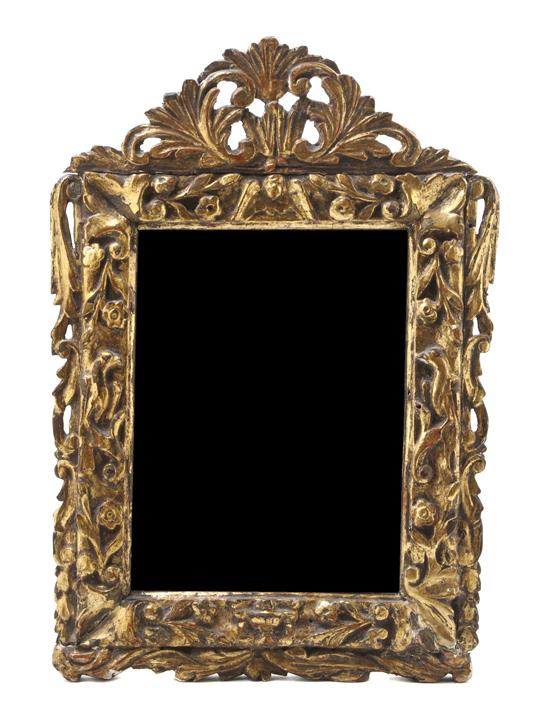 A Continental Giltwood Mirror having