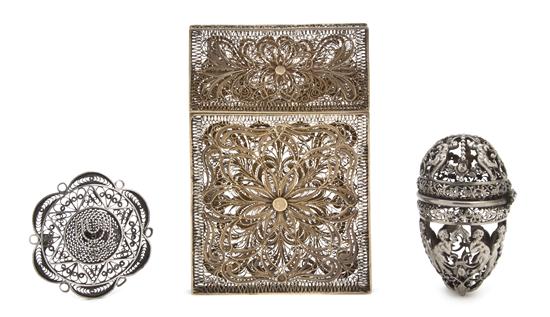 A Collection of Three Silvered Filigree