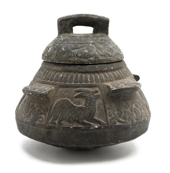 A Middle Eastern Carved Stone Vessel