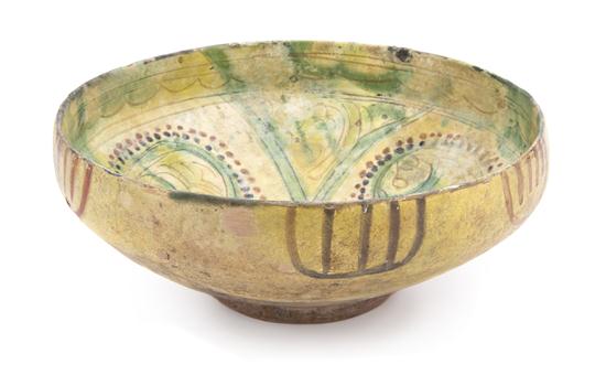 A Middle Eastern Pottery Bowl with yellow