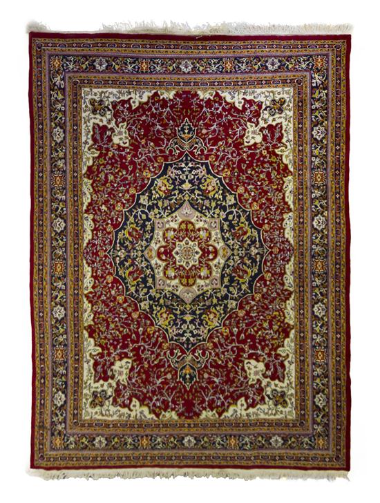 A Persian Wool Rug having a stylized 152ccf