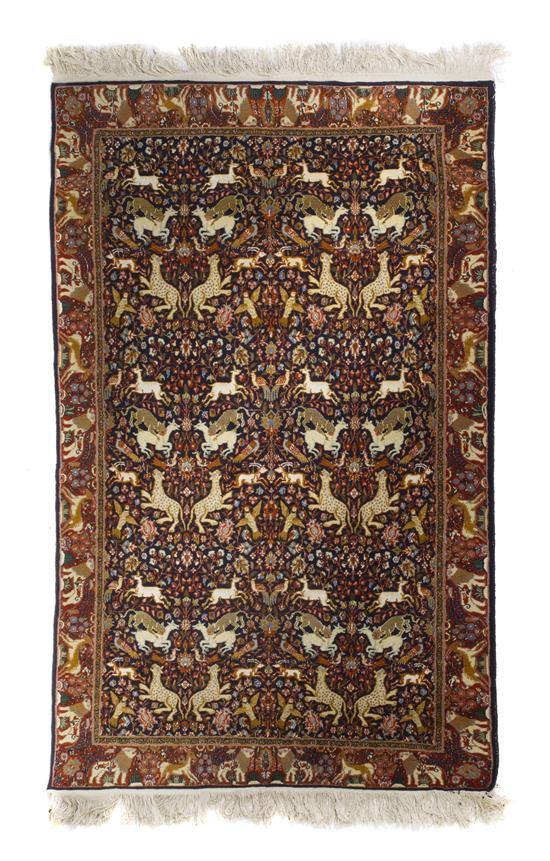 A Persian Wool Pictorial Carpet