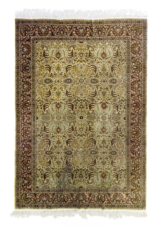 A Persian Silk and Wool Carpet