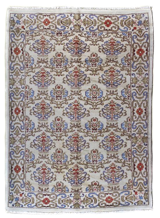 An Oushak Wool Rug having repeating 152cdc