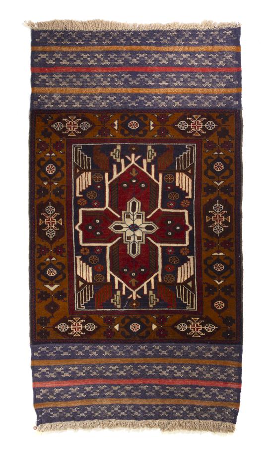 An Afghan Wool Rug having a four-lobed