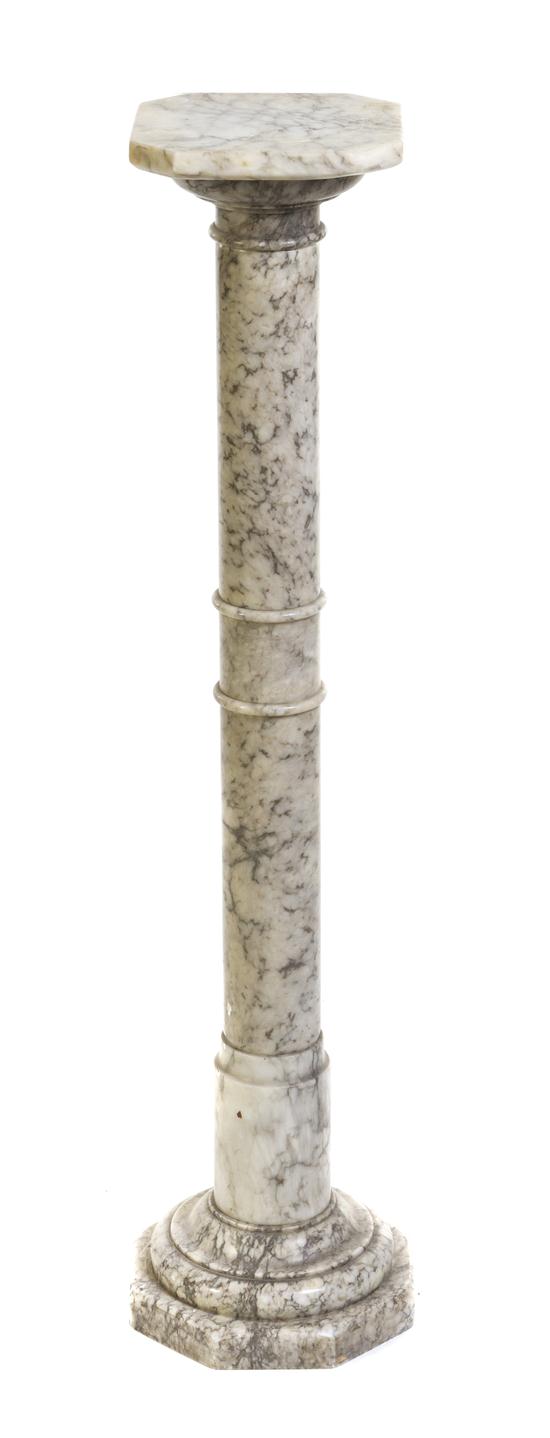 A Grey Marble Column having a square