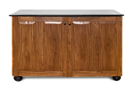 A Hardwood Cabinet 20th century having