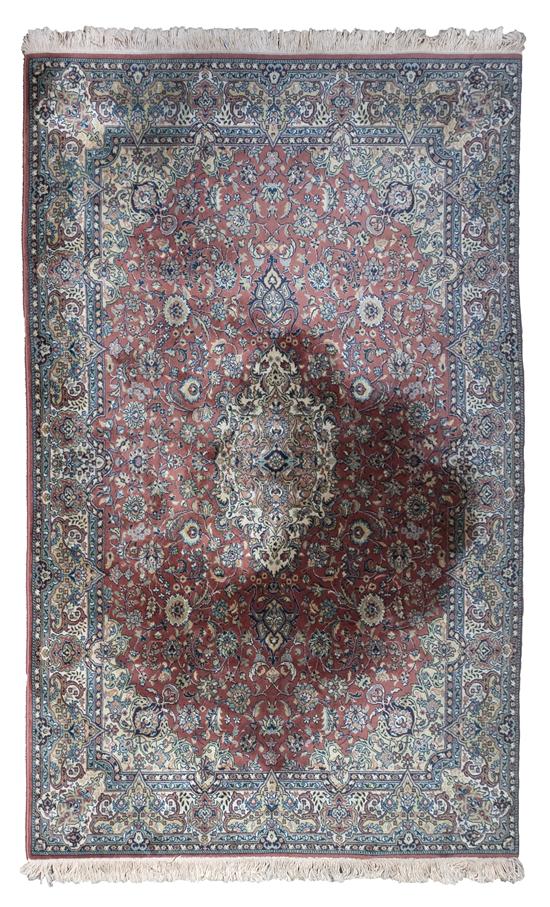 A Persian Wool Carpet having a 152dfb