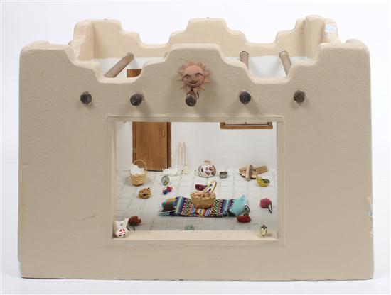 An Adobe Style Doll House in a single
