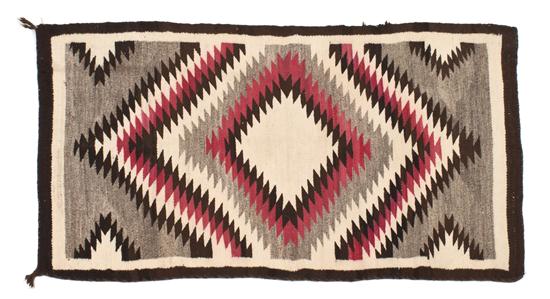 A Navajo Rug with eye dazzler design