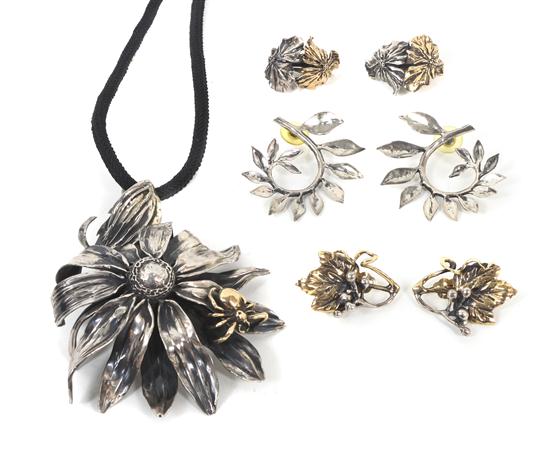 A Collection of Silver and Gold Tone