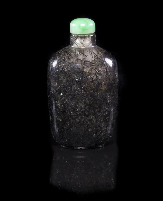 A Hair Quartz Snuff Bottle of rounded 152f1b