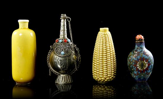 A Collection of Four Snuff Bottles comprising